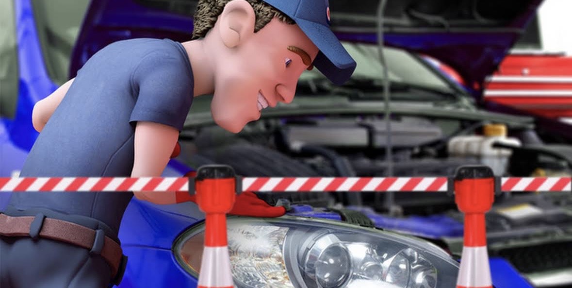 AD Huoltonovan mekaanikko työskentelee auton parissa